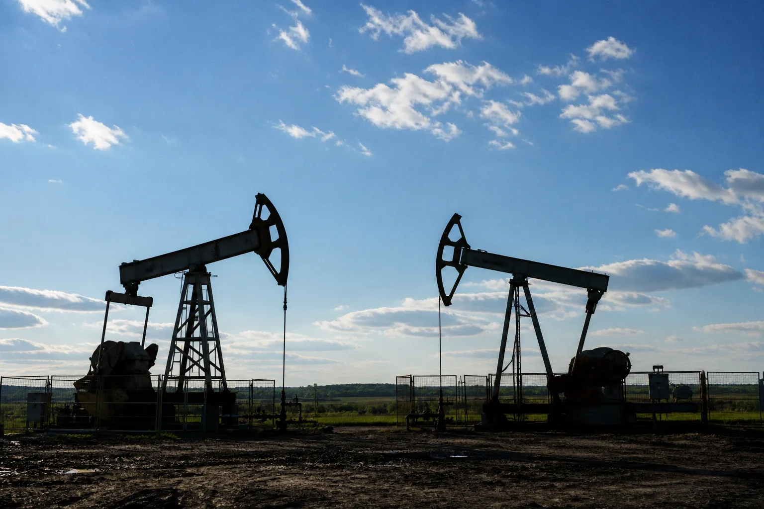 Stocks and oil prices drift as global markets continue to calm